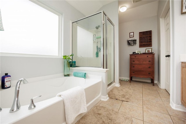 6005 Tapestry Dr, Corpus Christi, TX 78414 - full bath featuring a garden tub, a stall shower, tile patterned floors, vanity, and baseboards