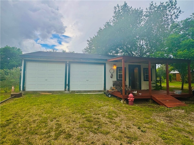 garage with a yard