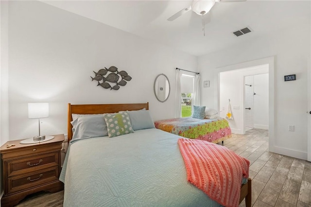 2013 Tule Park Dr, Rockport, TX 78382 - bedroom with light wood finished floors and ceiling fan