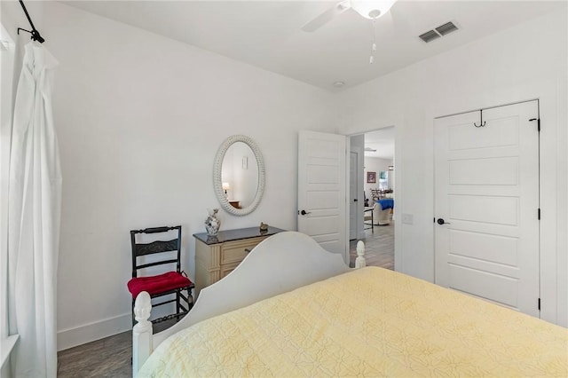 2013 Tule Park Dr, Rockport, TX 78382 - bedroom featuring wood finished floors and ceiling fan