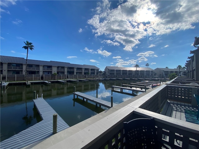 dock area with a water view