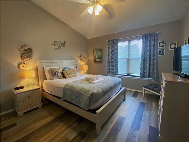 bedroom featuring dark wood-type flooring, ceiling fan, and lofted ceiling