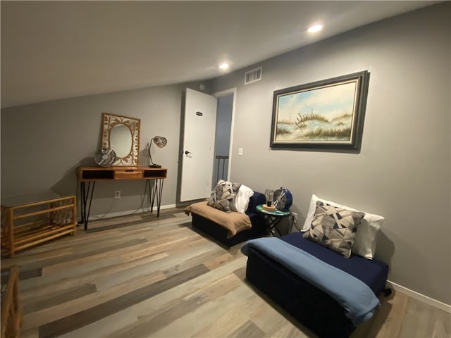 sitting room with hardwood / wood-style flooring