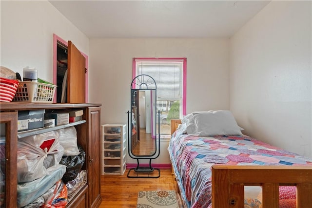 bedroom featuring light wood-type flooring