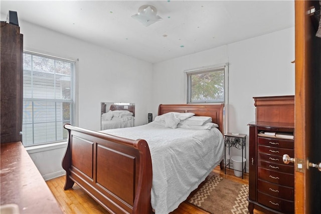 bedroom featuring light hardwood / wood-style flooring