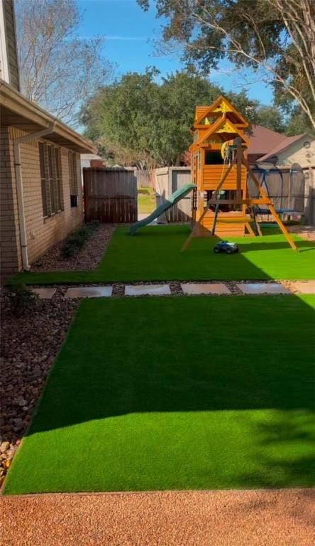 view of yard featuring a playground