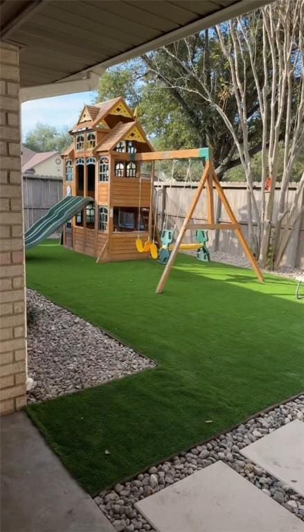 view of playground featuring a yard