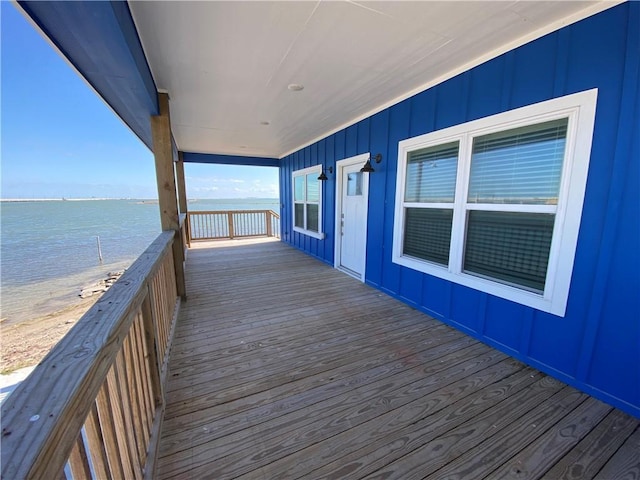 deck featuring a water view