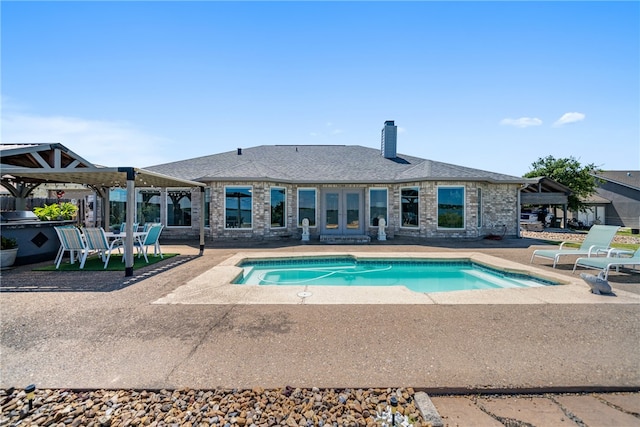 view of pool featuring a patio