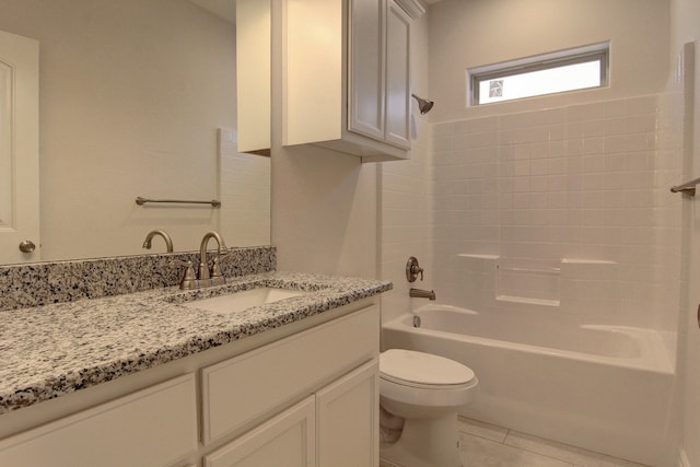 full bathroom with toilet, tub / shower combination, vanity, and tile patterned floors