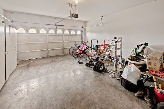 garage featuring bike storage and a garage door opener