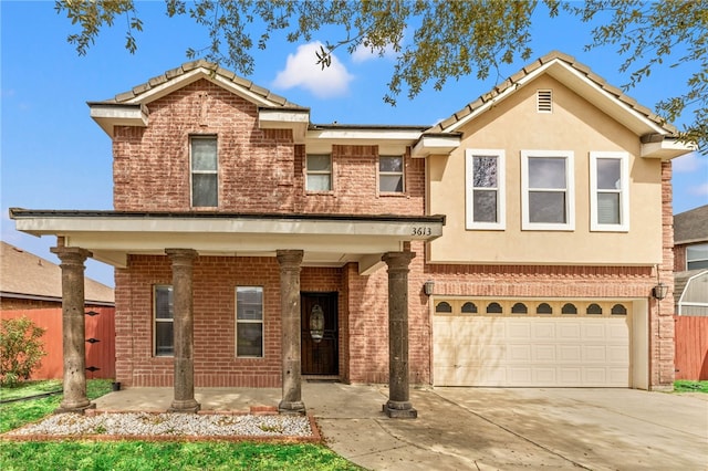 view of front facade featuring brick siding, stucco siding, concrete driveway, an attached garage, and a tiled roof