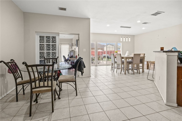 dining space featuring recessed lighting, visible vents, and light tile patterned flooring