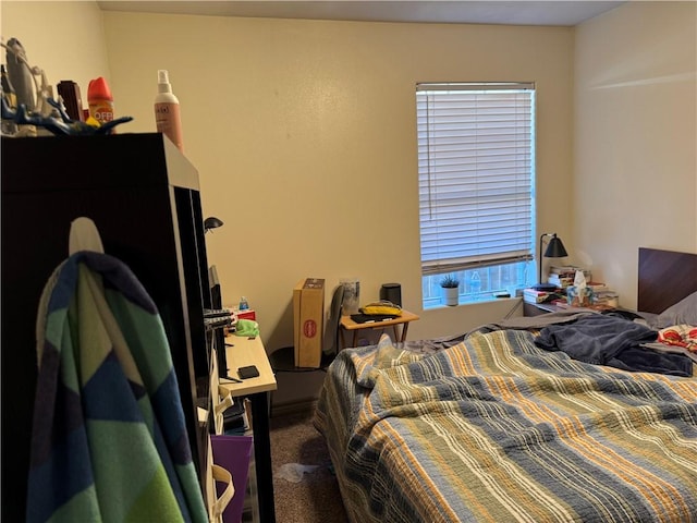 bedroom featuring carpet