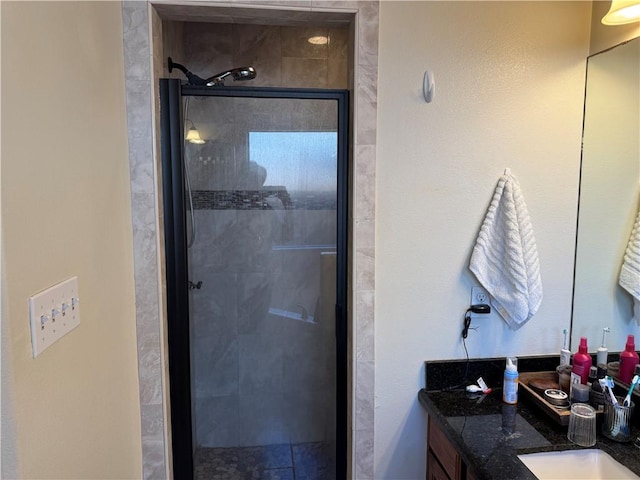 bathroom featuring vanity and walk in shower