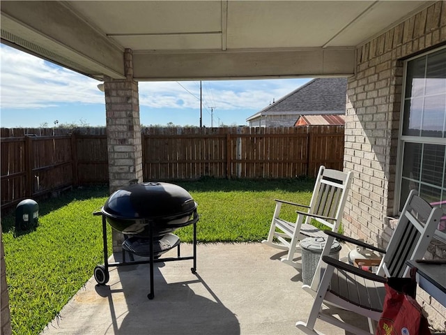 view of patio with a grill