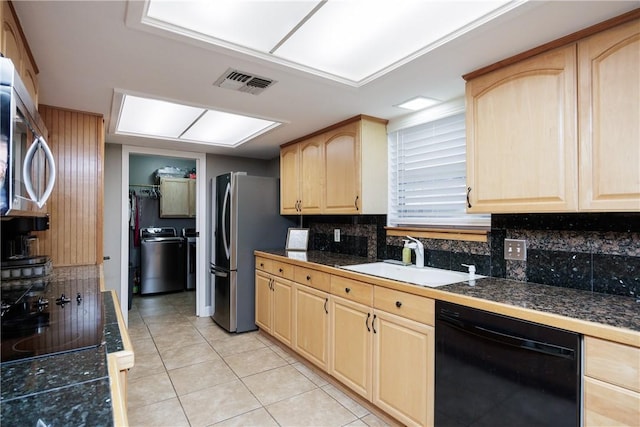 3346 Samoa Dr, Corpus Christi, TX 78418 - kitchen with appliances with stainless steel finishes, light brown cabinetry, a sink, and tile counters