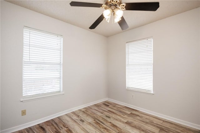 3346 Samoa Dr, Corpus Christi, TX 78418 - empty room featuring ceiling fan, wood finished floors, and baseboards