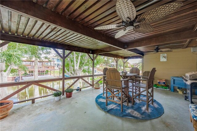 3346 Samoa Dr, Corpus Christi, TX 78418 - view of patio featuring a ceiling fan and outdoor dining area