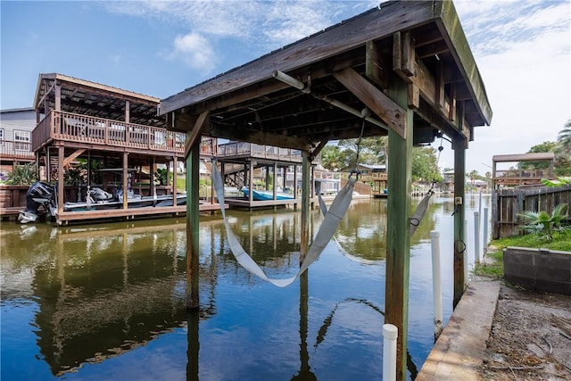 3346 Samoa Dr, Corpus Christi, TX 78418 - dock featuring boat lift and a water view