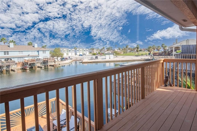 deck featuring a water view