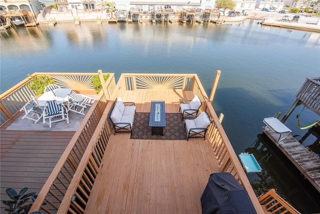 dock area with a water view