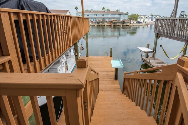 dock area featuring a water view