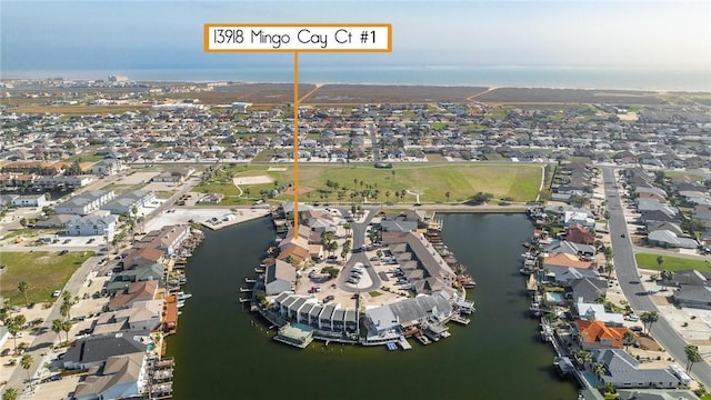 bird's eye view with a residential view and a water view