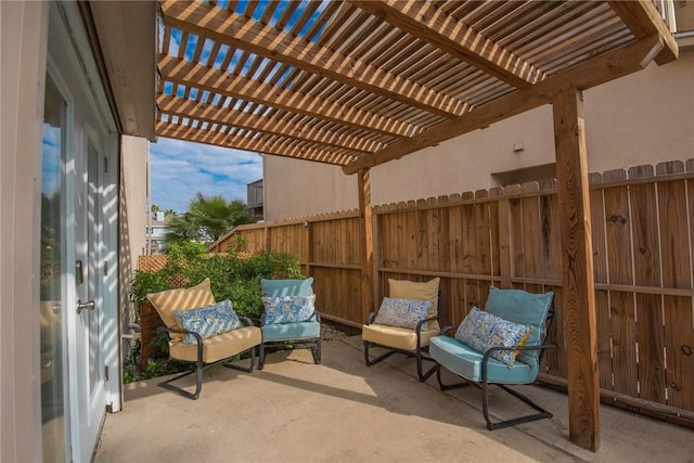 view of patio with fence and a pergola