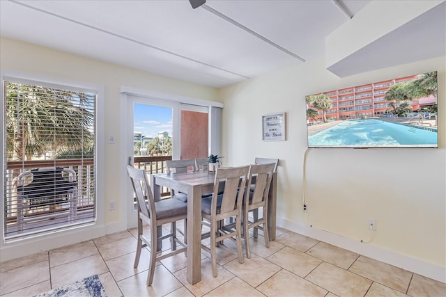 dining room featuring light tile patterned floors