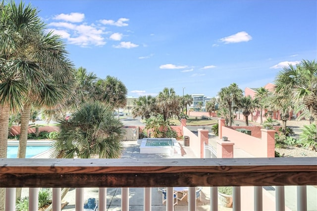 balcony featuring a jacuzzi