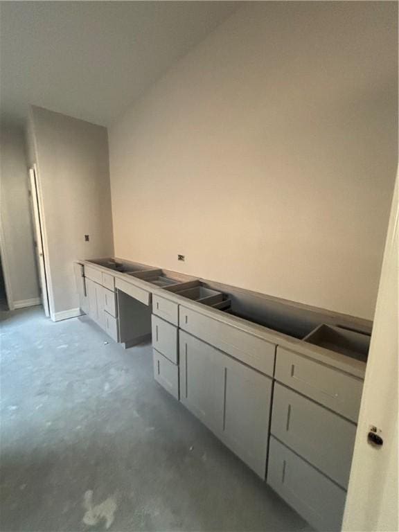 3102 Adak Ct, Corpus Christi, TX 78414 - bathroom featuring baseboards and concrete flooring