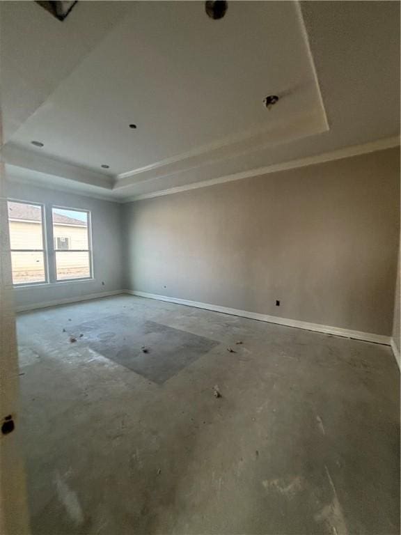 3102 Adak Ct, Corpus Christi, TX 78414 - unfurnished room featuring a tray ceiling, baseboards, and ornamental molding