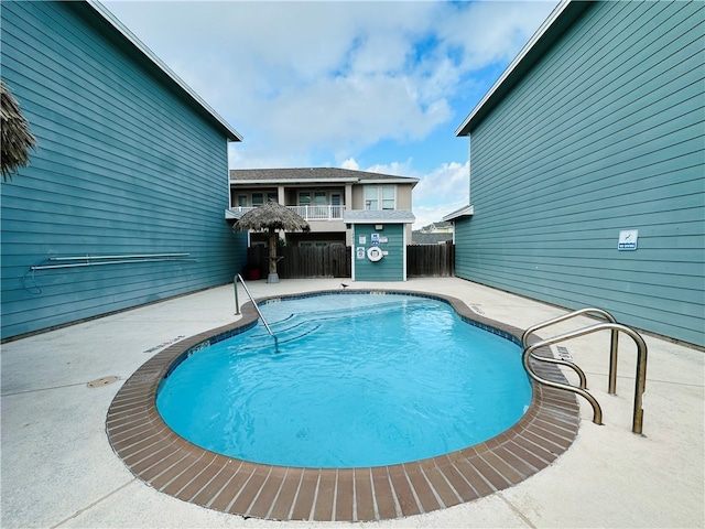 view of pool featuring a patio