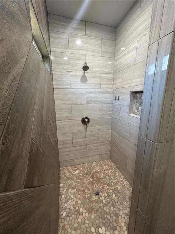 119 Moss, Odem, TX 78370 - bathroom featuring a tile shower