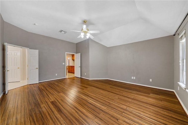 5609 Leicester Dr, Corpus Christi, TX 78414 - unfurnished bedroom featuring vaulted ceiling, hardwood / wood-style flooring, a ceiling fan, and connected bathroom