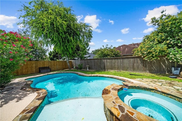 5609 Leicester Dr, Corpus Christi, TX 78414 - view of swimming pool with a fenced backyard, a patio, and a pool with connected hot tub