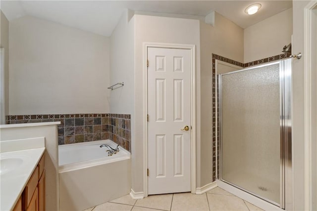 5609 Leicester Dr, Corpus Christi, TX 78414 - bathroom with tile patterned floors, a stall shower, a garden tub, and vanity