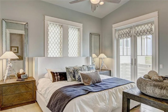 bedroom featuring access to outside, vaulted ceiling, ceiling fan, and light hardwood / wood-style flooring