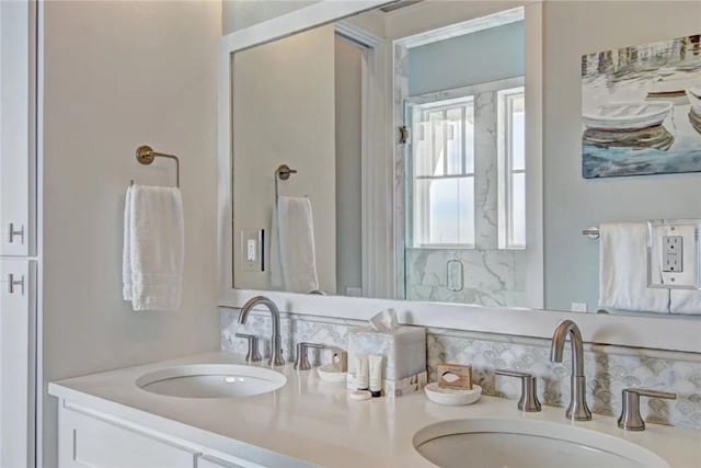 bathroom featuring vanity and walk in shower