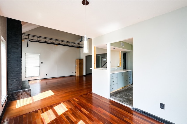 spare room featuring dark hardwood / wood-style flooring