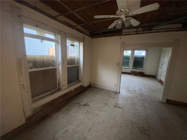 unfurnished room featuring ceiling fan