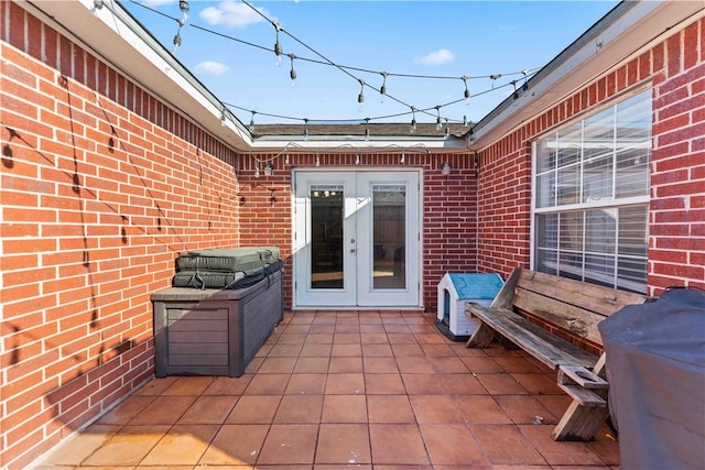 view of patio with french doors and grilling area