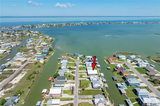 bird's eye view with a residential view and a water view