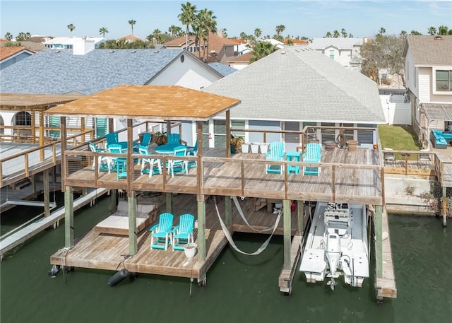 dock area with a water view