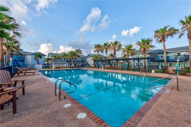 view of swimming pool featuring a patio area