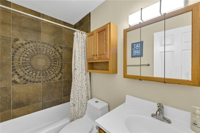 full bathroom featuring toilet, shower / bath combination with curtain, and sink