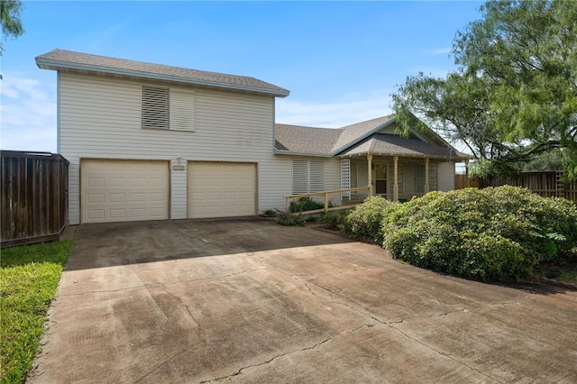 119 N Rife St, Aransas Pass, TX 78336 - view of front of property with driveway and an attached garage