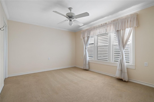 119 N Rife St, Aransas Pass, TX 78336 - empty room with light colored carpet, ornamental molding, ceiling fan, and baseboards
