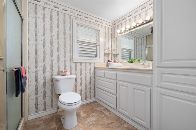 bathroom with walk in shower, vanity, toilet, and ornamental molding